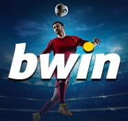 Un giocatore di calcio colpisce di testa durante una partita e il logo di bwin