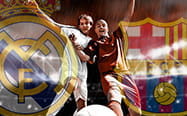 Due calciatori e gli stemmi di Real Madrid e Barcellona, in azione durante una partita di calcio