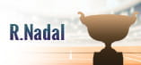 Il nome del tennista Rafael Nadal e il trofeo del vincitore del Roland Garros