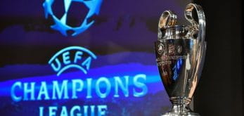 Il logo e il trofeo della Champions League